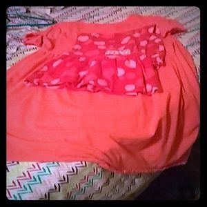 A disigned t-shirt with some cute pants.